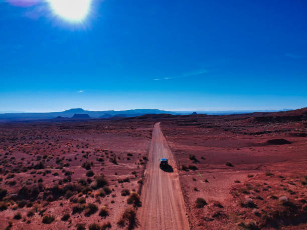 istock car driving throw the desert 1147531459