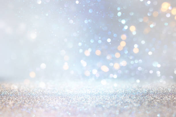istock glitter silver and gild lights background. de-focused 1147532884