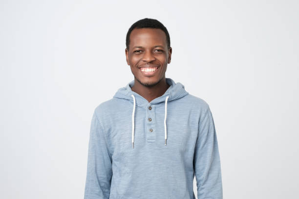 istock Laughing handsome young african man smiling confident 1147534378
