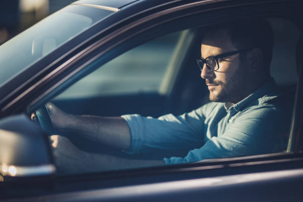 istock Serious businessman going on business trip by car. 1147534668