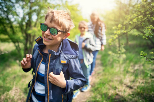 istock Family hiking in spring forest 1147534830