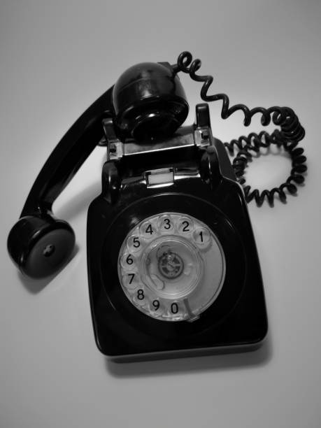 istock A vintage and antique telephone with white background. 1147537737