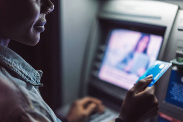 Woman at the ATM device