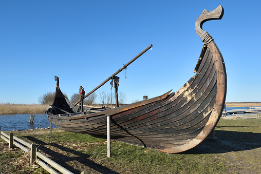 Old Wooden Viking Boat on seashore