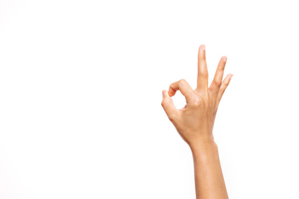 woman hand ok sign on white background