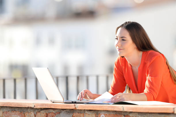 istock Self employed working in a balcony contemplating views 1147543074