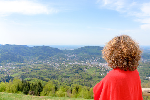 Woman tourist looking out over the Black Forest