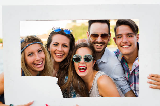 istock Group of young happy friends having fun time 1147544448