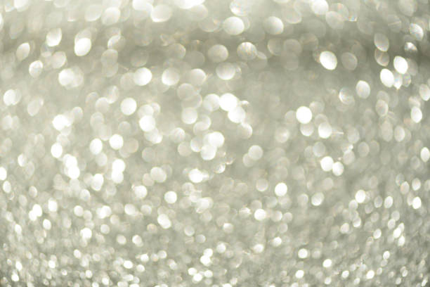 istock Silver abstract bokeh lights. Defocused background with copy space. New year and Christmas concept. Greeting card 1147544459