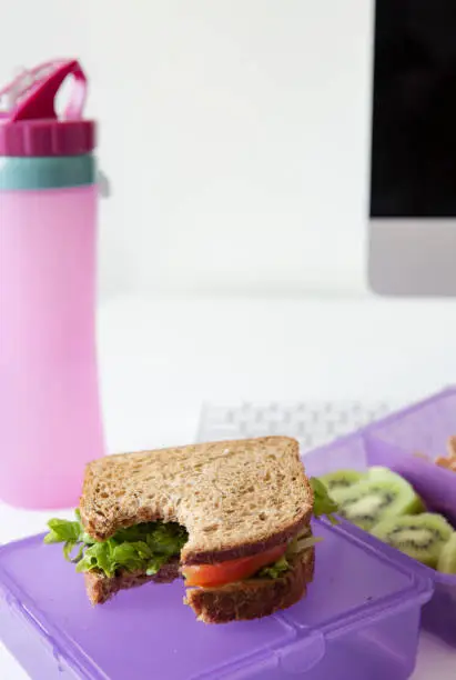 Photo of Office desk with lunch box