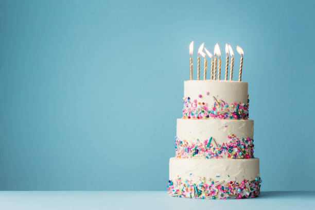 istock Tiered birthday cake with sprinkles 1147550086