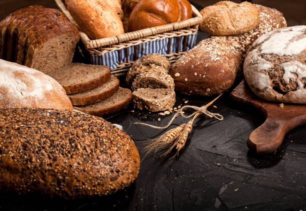 istock Assortment of baked goods on dark background 1147550806