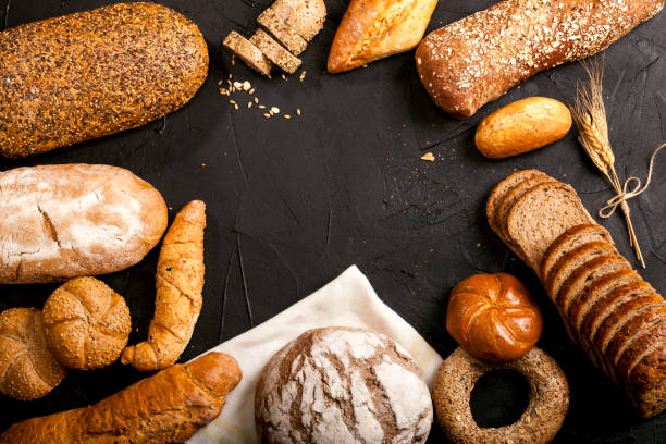 istock Assortment of baked goods on dark background 1147550857