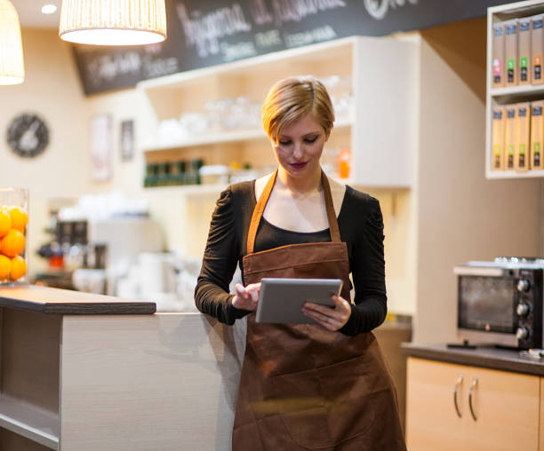 istock Young female bar owner portrait 1147551189