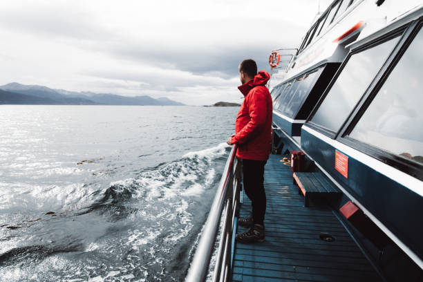 istock Man exploring the Beagle Channel in Ushuaia by cruise ship 1147552804
