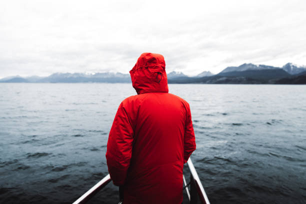 istock Man exploring the Beagle Channel in Ushuaia by cruise ship 1147556089
