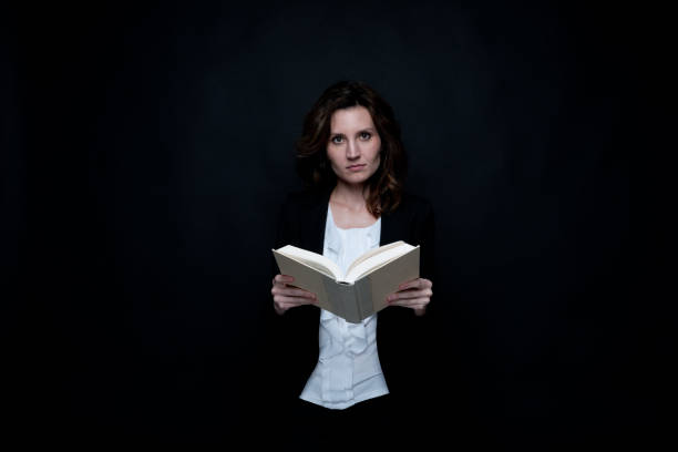istock Businesswoman is reading a book 1147556407