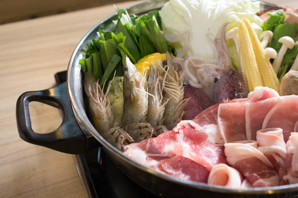Togetherness and tradition blend in a lively Chinese New Year hot pot gathering.