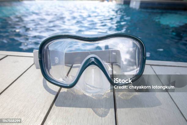 Closeup On Snorkel Mask With Swimming Pool Background Stock Photo - Download Image Now