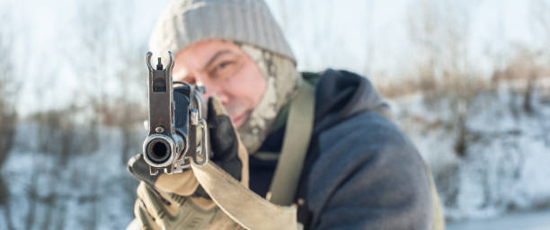 istock Kalashnikov rifle front view gun point. Direct machine gun close-up 1147559508