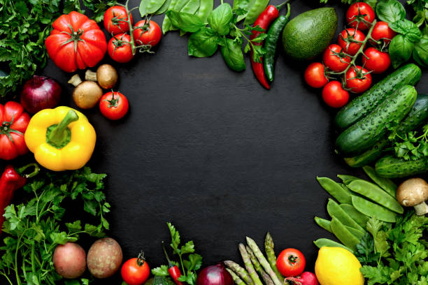 Dark culinary background with fresh produce stock photo