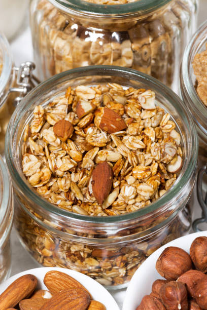 istock assortment of breakfast cereals and nuts, vertical closeup 1147562203