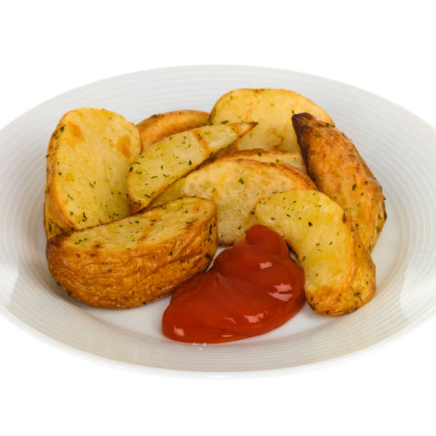 istock Plate of Potato Wedges or Chips With Tomato Sauce 1147566548