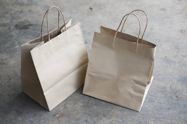 istock Brown recycle paper shopping bag with copy space 1147566973