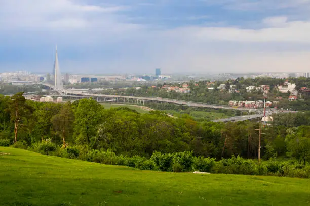 Photo of Scenic view of the Serbian capital Belgrade. Ada bridge. Kosutnjak