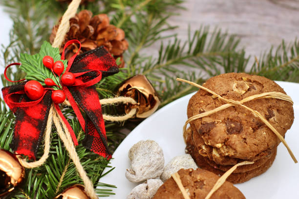 istock Christmas decorations - oat biscuits for Santa Claus and branches of coniferous trees 1147568690