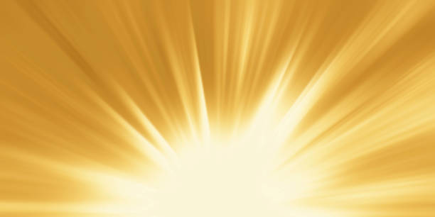 抽象的な黄色の背景。ゴールドバーストのマジックライト - 太陽光線 ストックフォトと画像