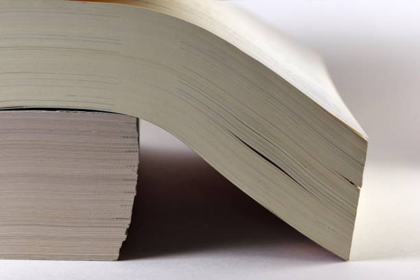 istock Closeup of two thick books stacked 1147572089