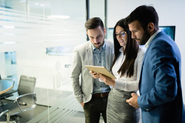 istock Picture of businesspeople using digital tablet in office 1147573620