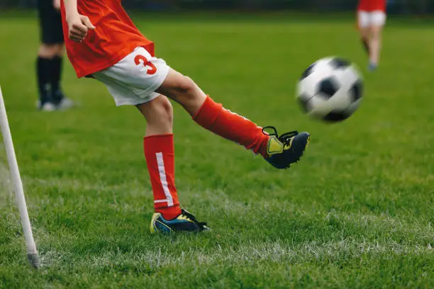 Photo of Soccer Corner Kick on the Grass Field