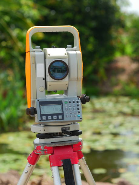 istock Surveyor equipment outdoors theodolite on tripod 1147579142