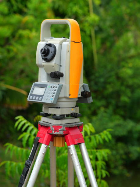 istock Theodolite with Surveyor 1147581138