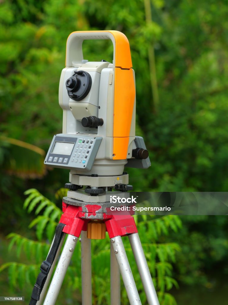 Theodolite with Surveyor Outdoors, Close-up, Land, Laser, Surveyor Agriculture Stock Photo