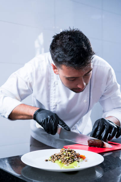 istock A professional chef prepares and decorates a dish with a delicious beef tenderloin 1147583499