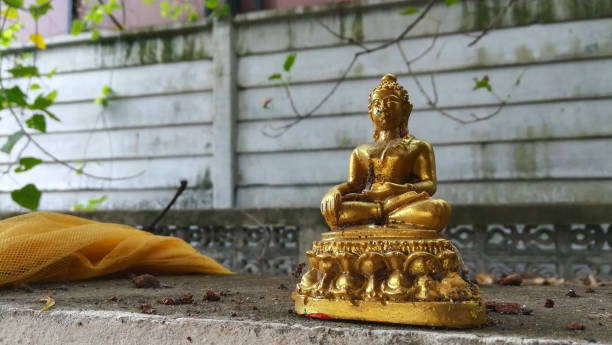 istock gold Buddha statue in Thailand temple 1147584124