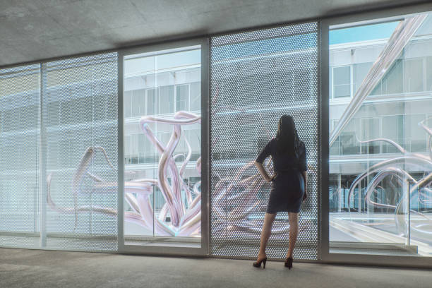 istock Abstract office businesswoman with alien tentacles 1147584237
