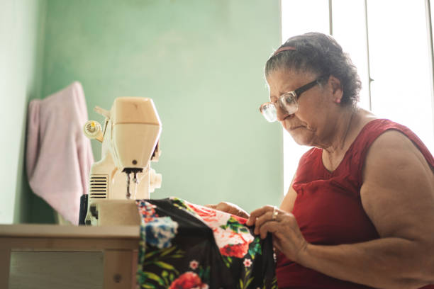 istock Senior women sewing at home 1147587233