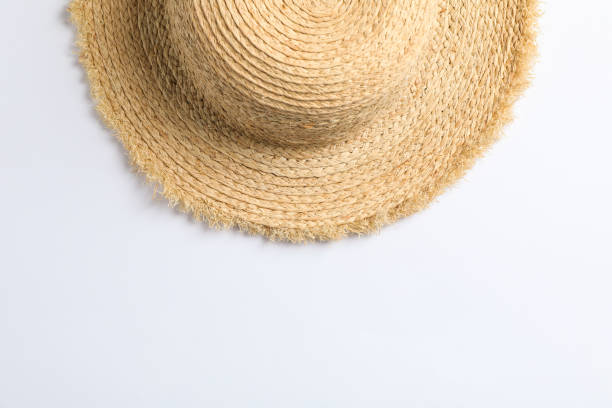 istock Pretty straw hat on white background. Space for text, top view 1147591822