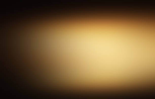 dark gold and black defocused abstract gold background