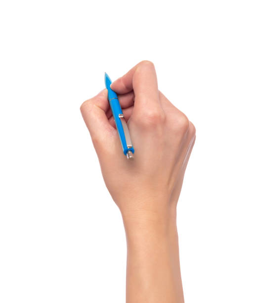 istock Female hand holding a pen on white background. 1147594377
