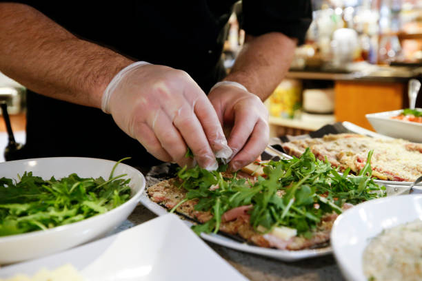 A chef prepares fresh Italian Food stock photo