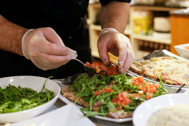 istock A chef prepares fresh Italian Food 1147597858