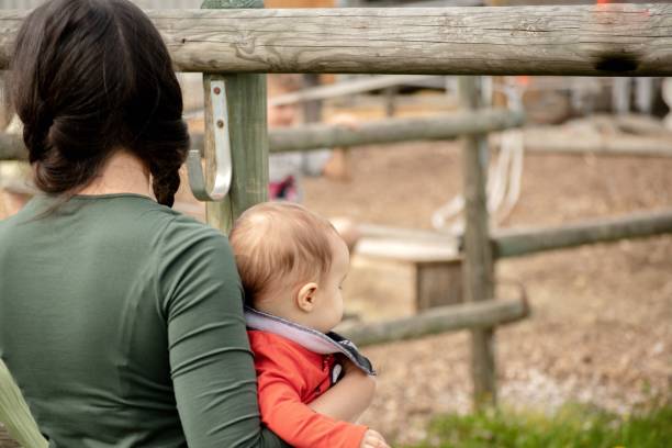 istock Mommy and baby on farm 1147602619