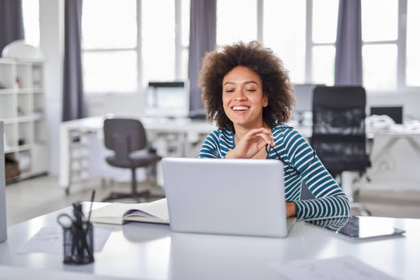 istock Businesswoman sitting in modern office and thinking. 1147603925