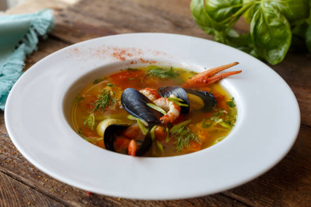 istock Homemade soup wit seafoods. Mussels and crayfish 1147605027