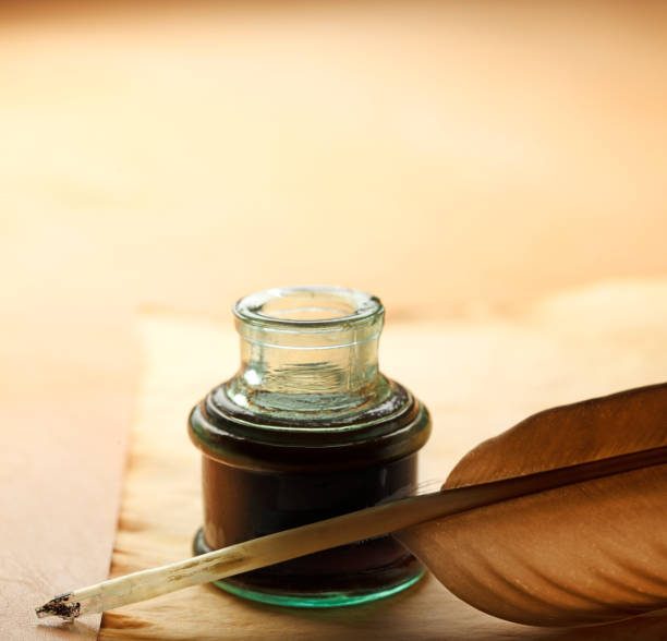 istock Feather Quill And Inkwell 1147606661